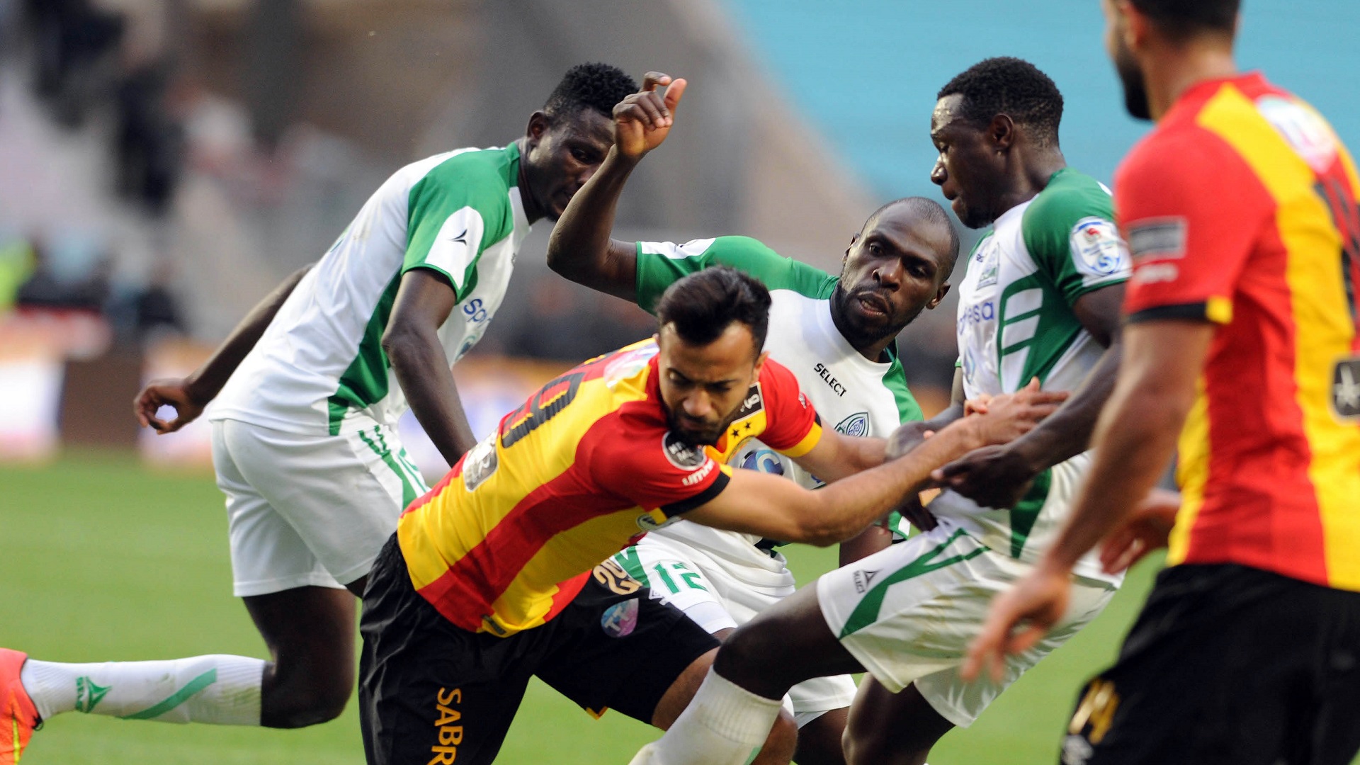 Esperance de Tunis player Khnissi Taha Yassine and Gor Mahia players fight for the ball during the 2018 CAF Champions League