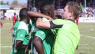 Gor Mahia coach Dylan Kerr celebrates with Haroun Shakava.