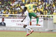 John Bocco (L) of Azam FC fights for aerial ball with Kelvin Yondani of Young Africans SC