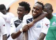 George Odhiambo and teammate Karim Nizigiyimana of Gor Mahia celebrate