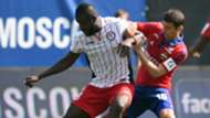 Fegor Ogude of Amkar Perm and Alan Dzagoev of CSKA Moscow