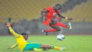 John Banda (Malawi) tackled by Motjeka Madisha (South Africa) Cosafa cup 28 May 2015