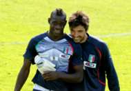 Mario Balotelli and Gianluigi Buffon of Italy
