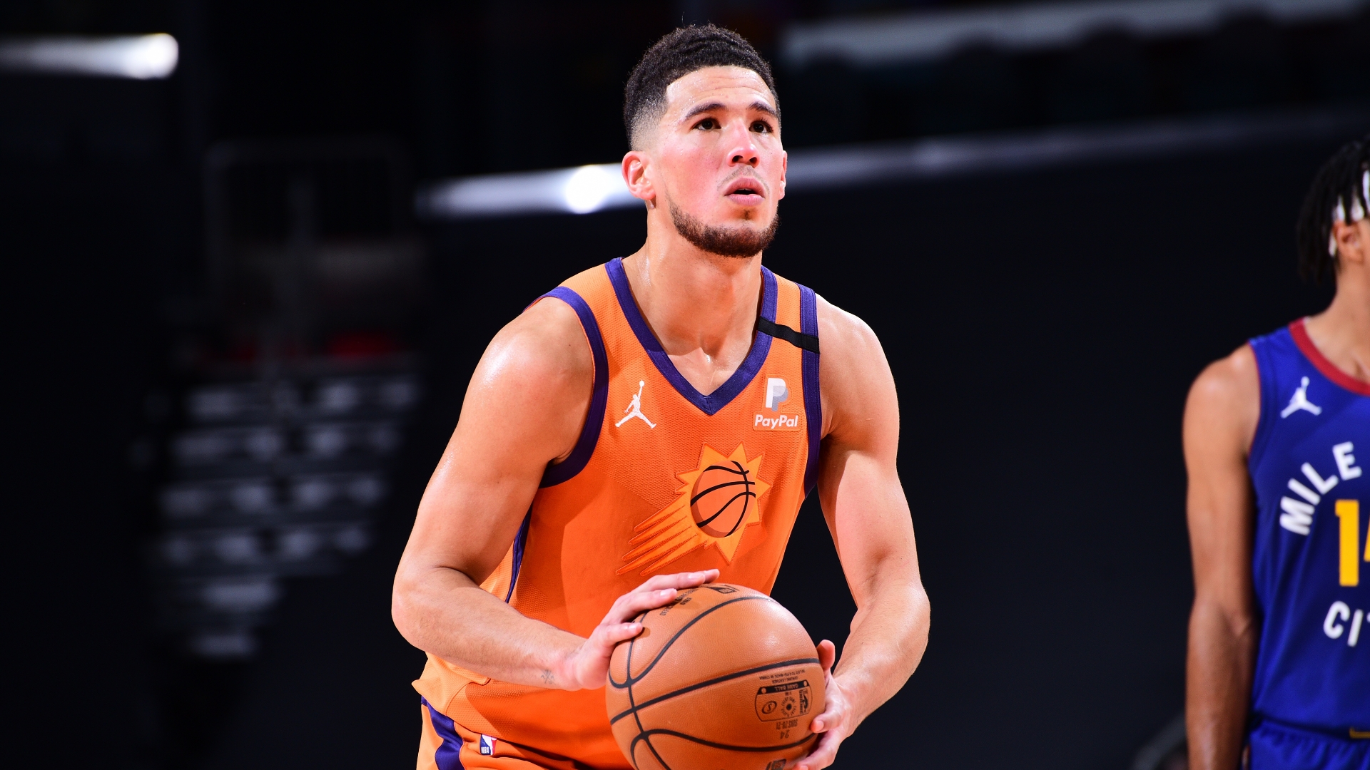 Devin Booker injures hamstring as Nuggets register