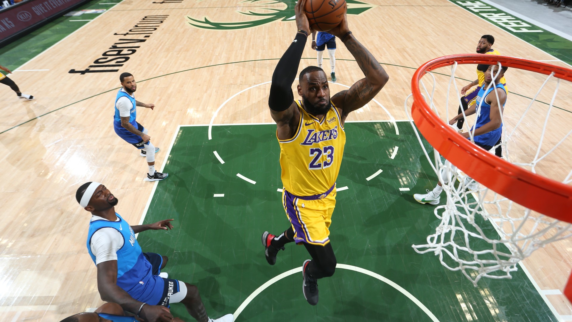 Hot shooting LeBron James helps Los Angeles Lakers close out Milwaukee