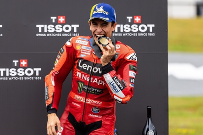 images-amp-0RrQy9o0-s2-podio-marc-marquez-ducati-team