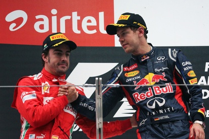 images-amp-2wBWybV0-s2-podio-sebastian-vettel-red-bul
