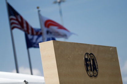 images-amp-6l98lM80-s2-the-fia-logo-in-front-of-an-am-3