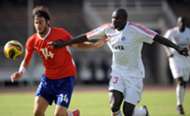 Kenya's Harambee Star's player George Owino (R) vies for the ball against Namibia's Milko Risser on September 6, 2008.