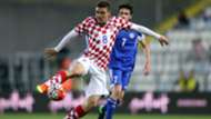 Croatian midfielder Mateo Kovacic controls the ball against San Marino