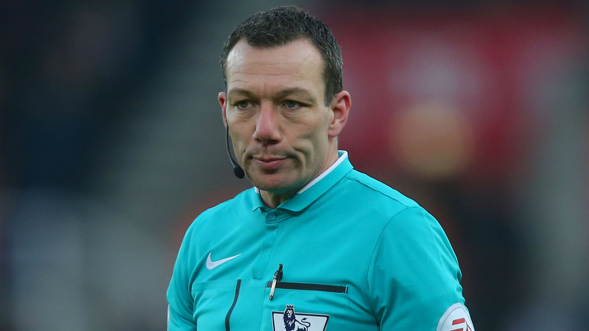 referee in spurs shirt