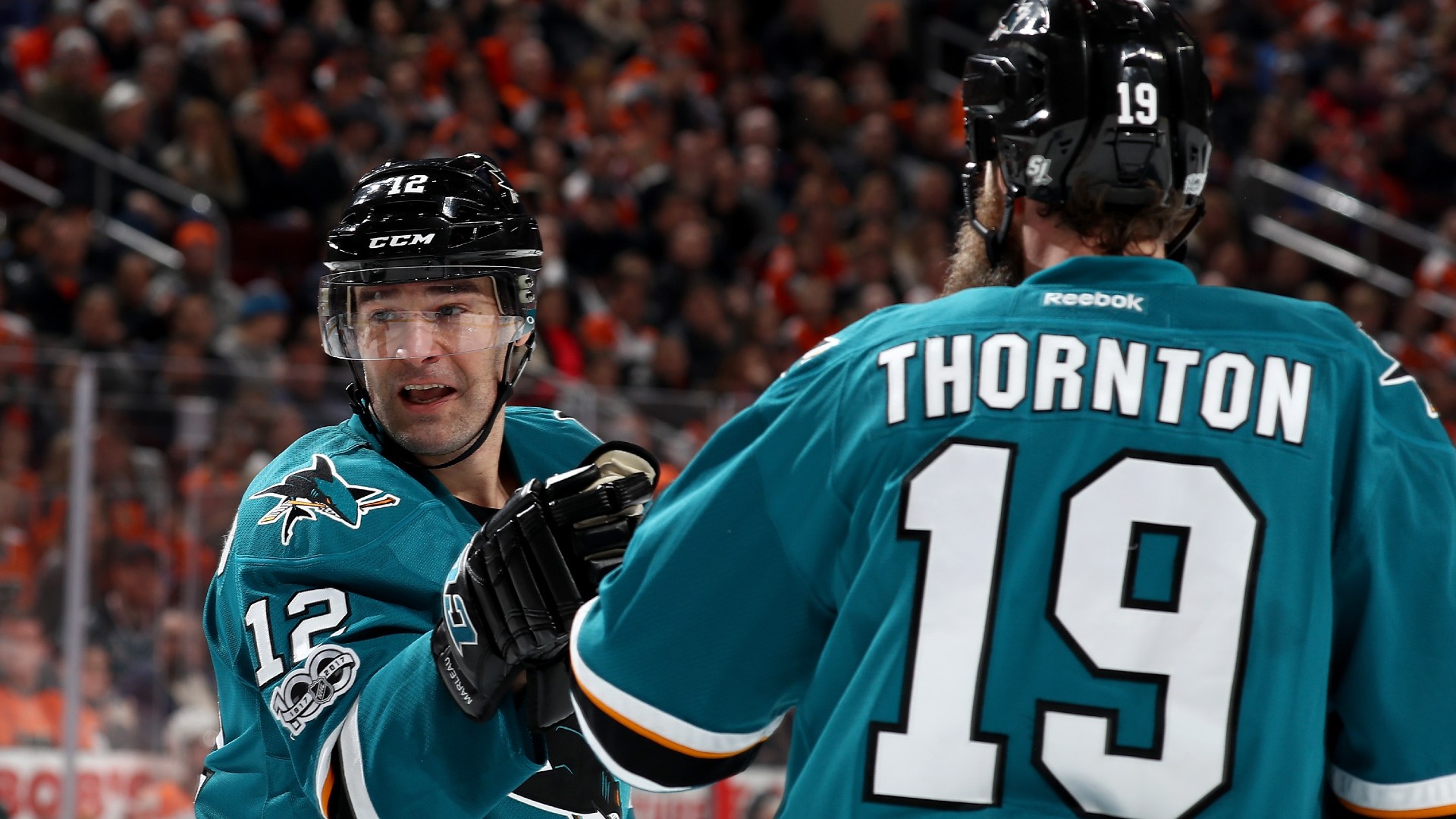 Leafs Joe Jay Thornton congratulates Patrick Marleau on NHL records