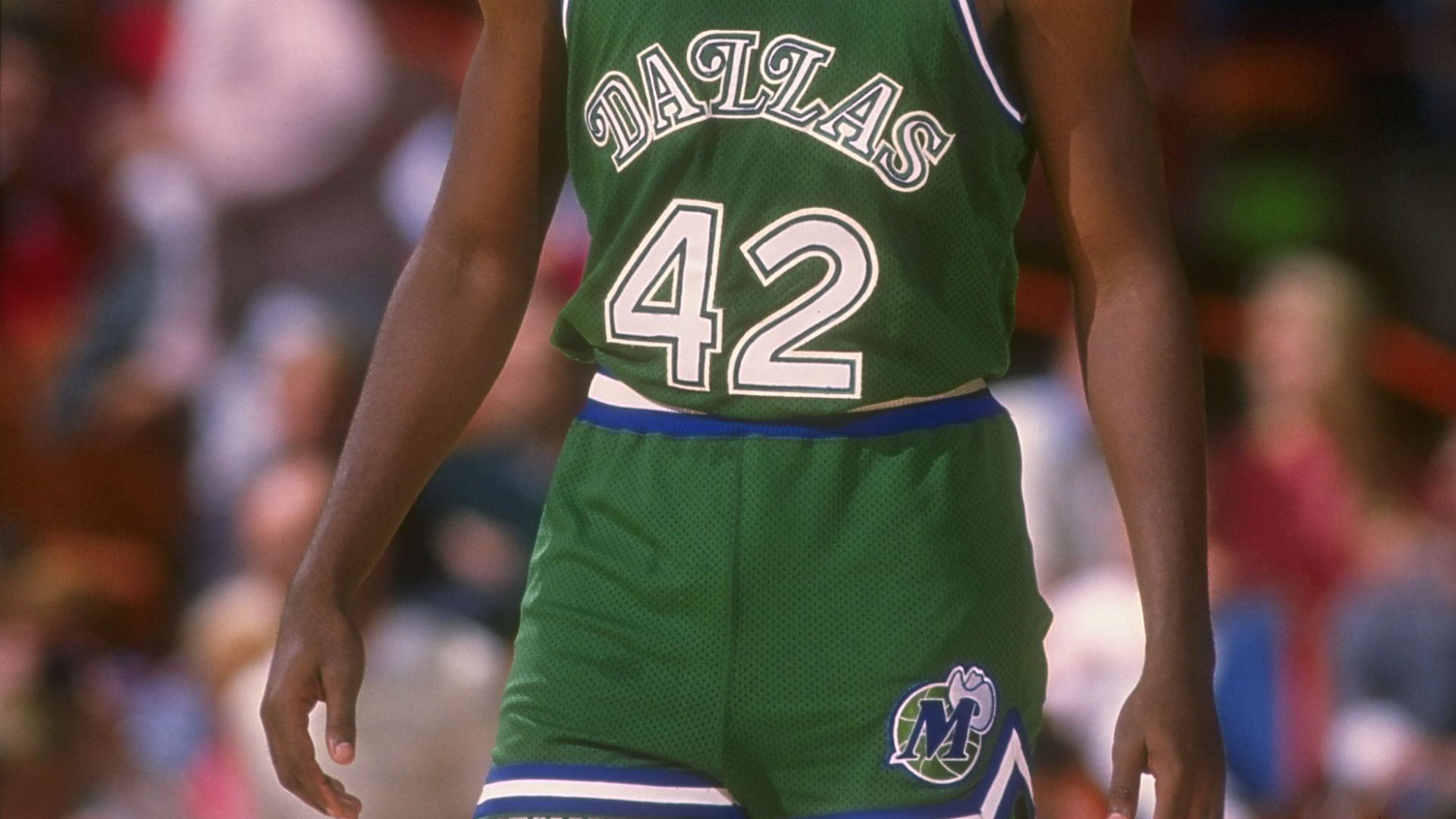 purple and green basketball jersey